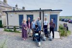 Members of the council and public outside the new facilities